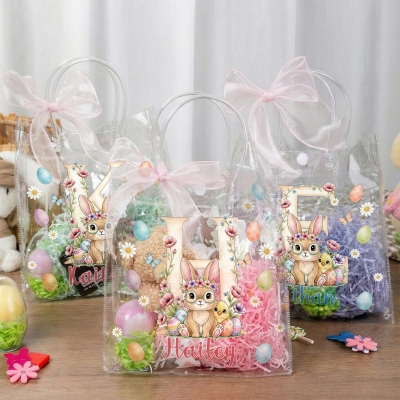 Personalisierte Ostergeschenktasche mit Namen, Blumenmuster, Hasenmotiv und rosa Schleife, durchsichtige PVC-Ostereiersuche-Tasche, Ostergeschenk für Kinder/Mädchen/Jungen