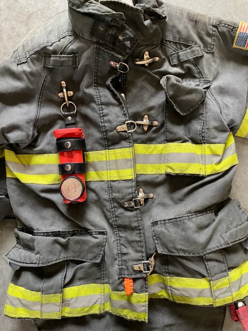 Firefighter inverted flashlight holder